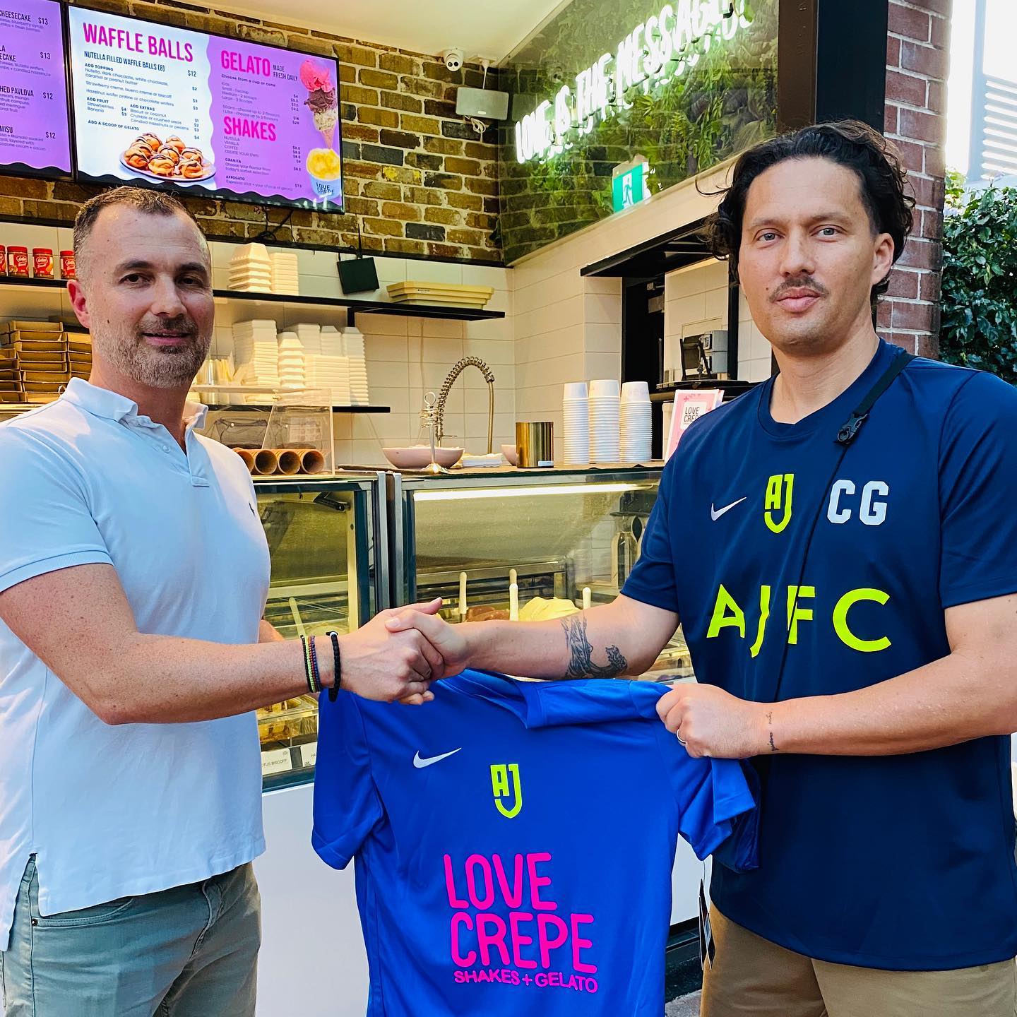 Presentation of special Love Crepe AJFC jersey